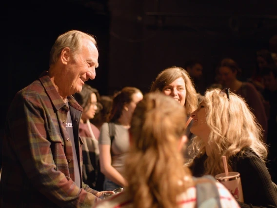 actor craig t. nelson smiling and speaking with students