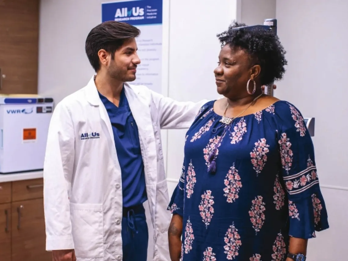 a doctor measuring a patient&#039;s height